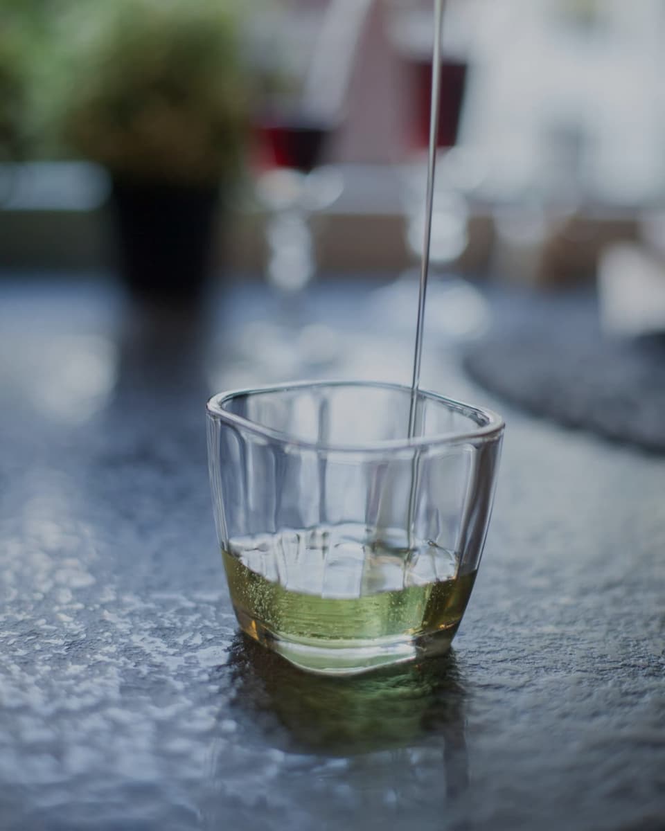 Chilled sake poured into a small glass